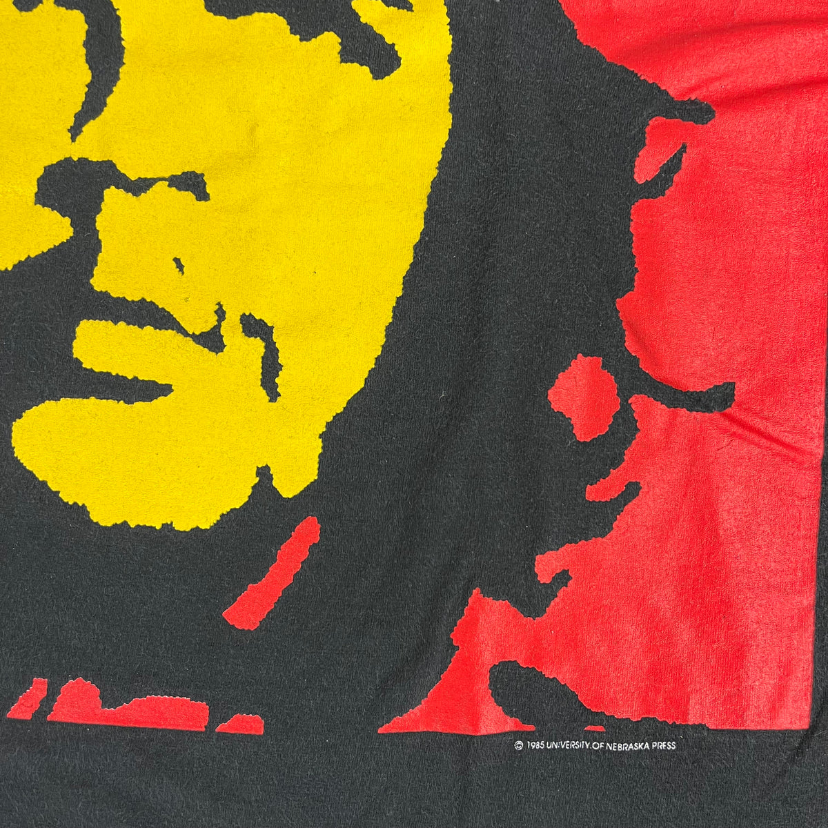 A red T-shirt with the portrait of Che Guevara for sale on a booth